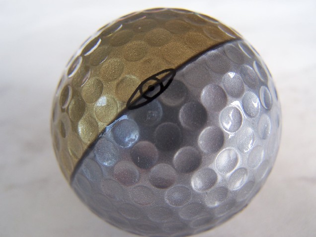 Two-tone vintage Ping golf ball example