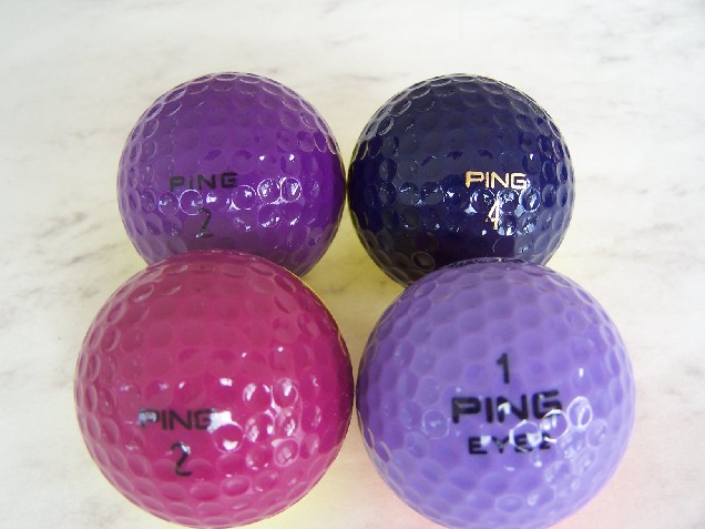 Collectible vintage Ping golf ball pair