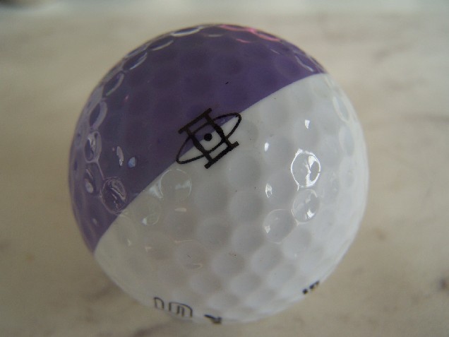 Vintage two-tone Ping golf ball closeup
