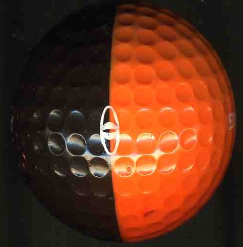 Black and Orange Ping Eye two-tone golf ball macro closeup