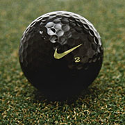 Nike One Black golf ball on grass
